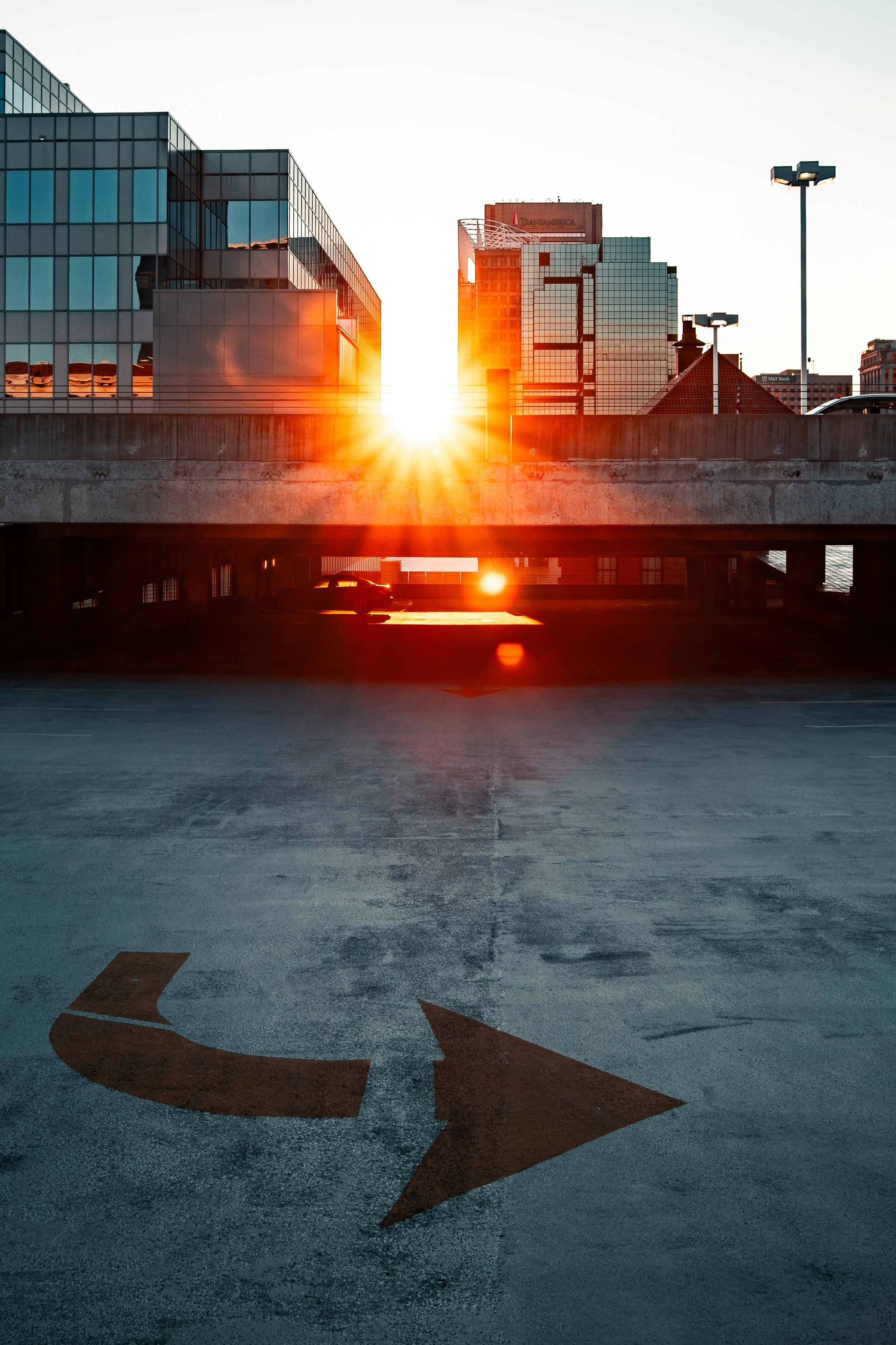 red car on gray concrete road during daytime